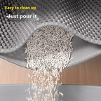 Mat opened flat to empty trapped litter