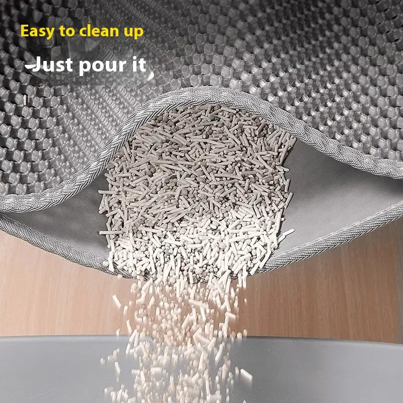 Mat opened flat to empty trapped litter